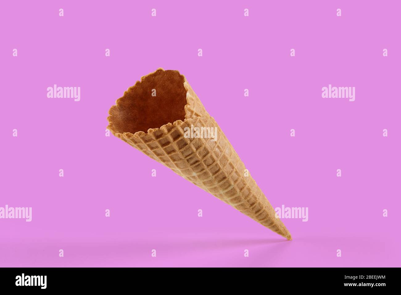 Download Empty Crunchy Wafer Cone For Ice Cream Against Pink Background Concept Of Food Treats Mockup Template For Your Advertising And Design Close Up Stock Photo Alamy