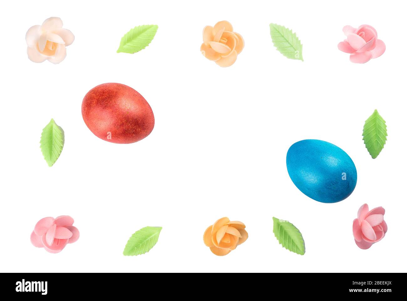 Easter still life with painted eggs and a sweet decor of flowers and ...