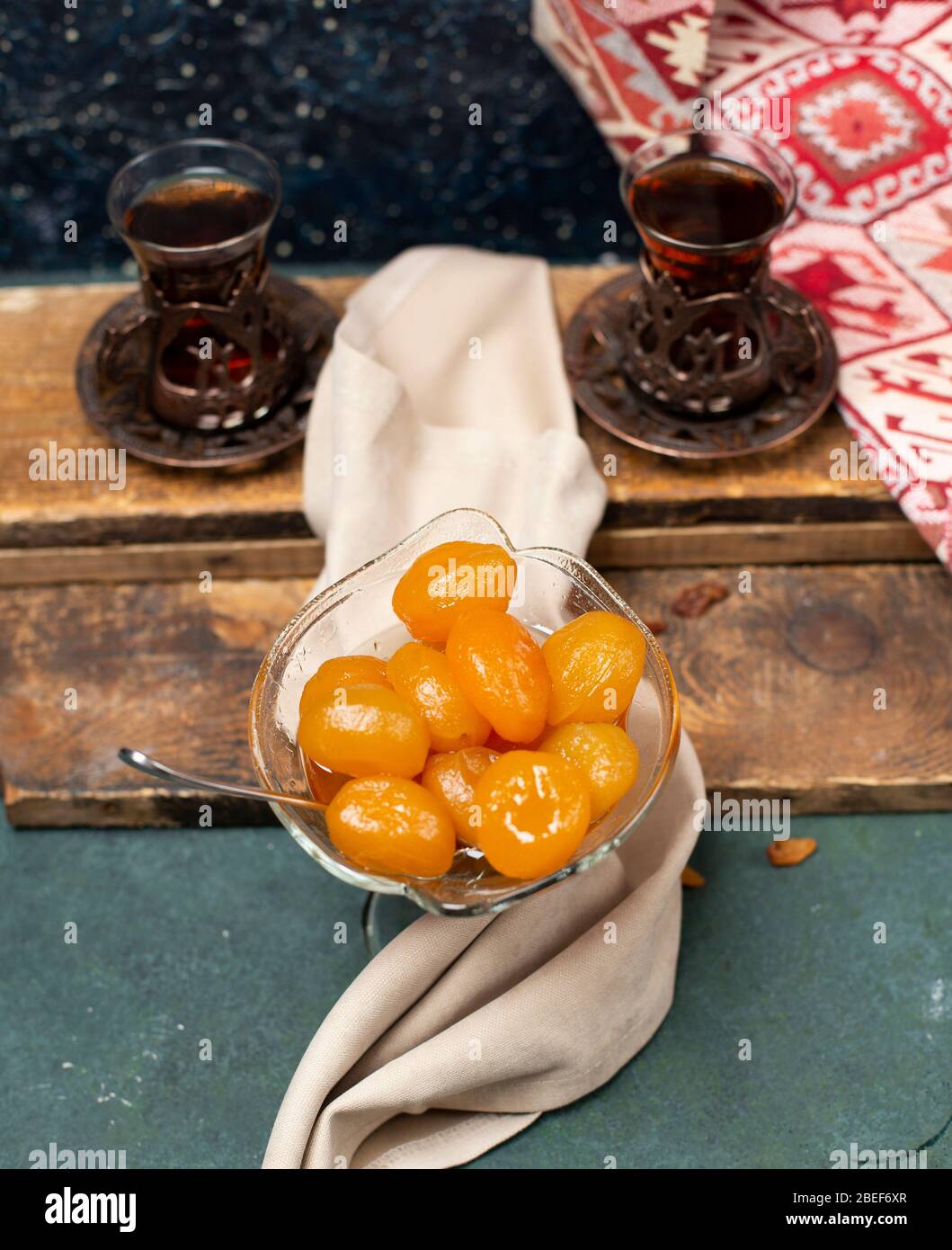 tea and fig jam with wooden background Stock Photo - Alamy