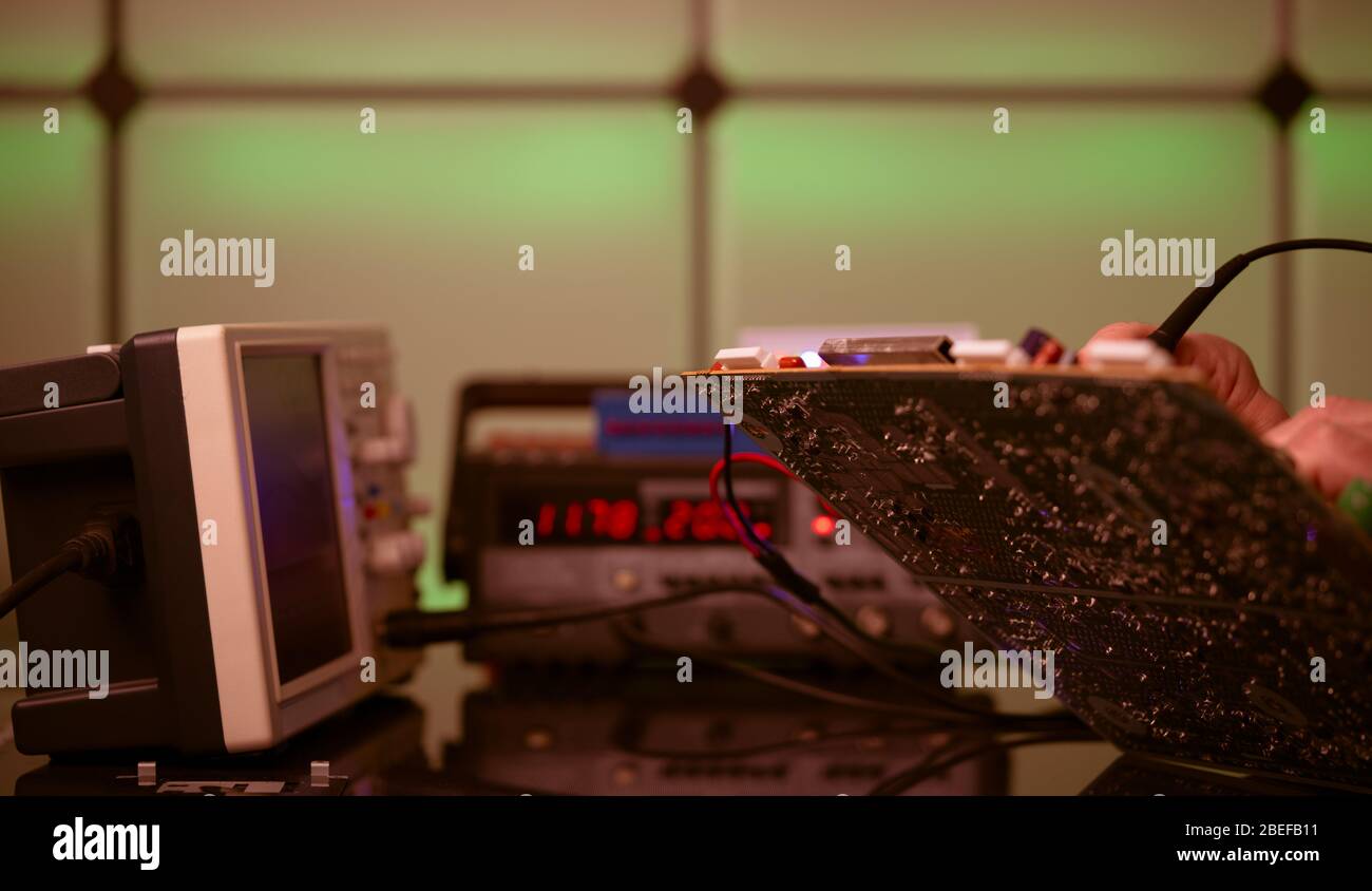 PCB witch microcontroller in electronics laboratory Stock Photo
