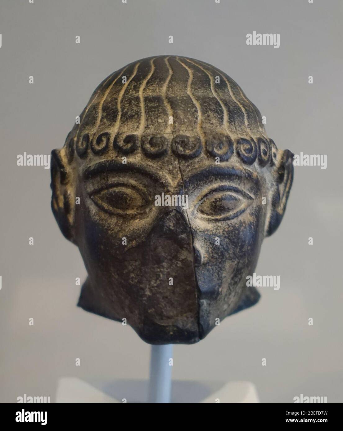 Head of a warrior, Akkadian, c. 2340-2180 BC, dark limestone Stock Photo