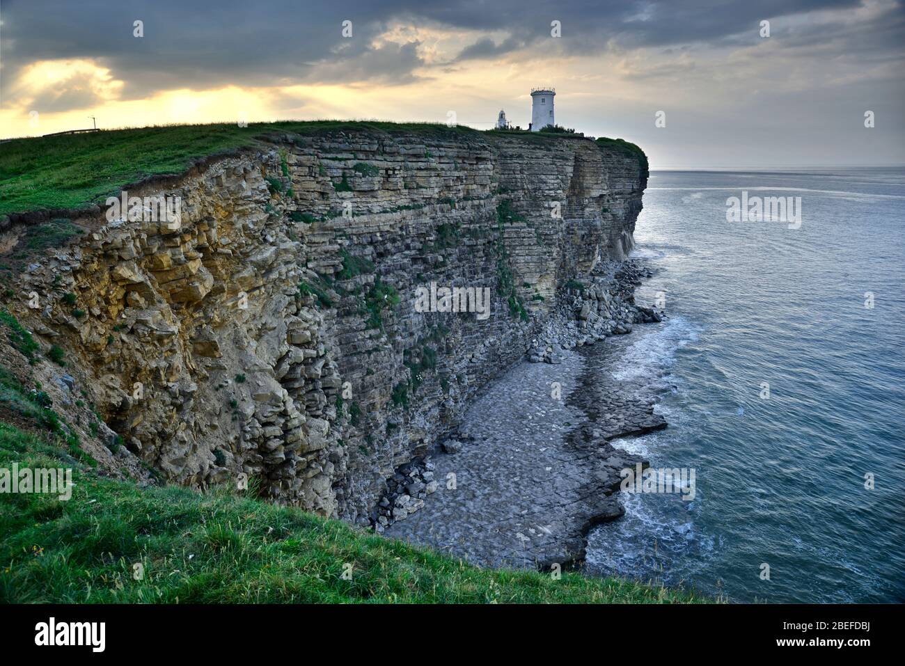 Nash Point and Lighthouse at sunrise, South Wales (1) Stock Photo