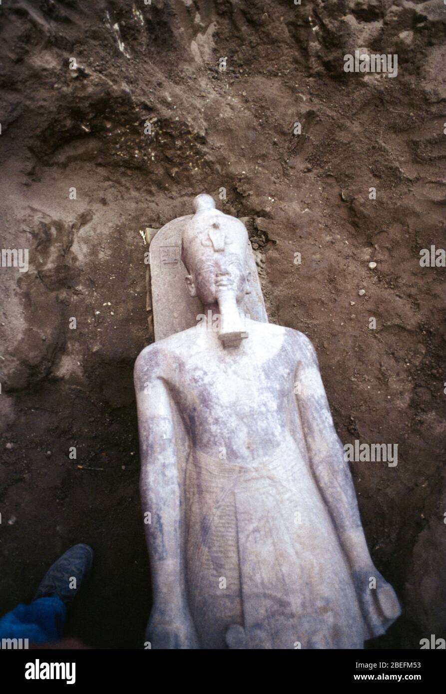 22 January 1989 - Luxor, Egypt -- The Luxor Temple statue cache was one of the most significant archaeological discoveries of the decade, where a grouping of ancient Egyptian statues was unearthed on January 22nd, 1989, during routine maintenance of the temple in a heavily traveled tourist area.  They were discovered beneath the solar court of the 18th dynasty Pharaoh Amenhotep III.  A partial list of statues: Thutmosis III, Amenhotep III, the goddess Lunyt, Tutankhamun, Horemheb, Amun-Re-Kamutef and the Goddess Tawaret.  The excavation was launched in 1989 under the authority of Mohamed El So Stock Photo