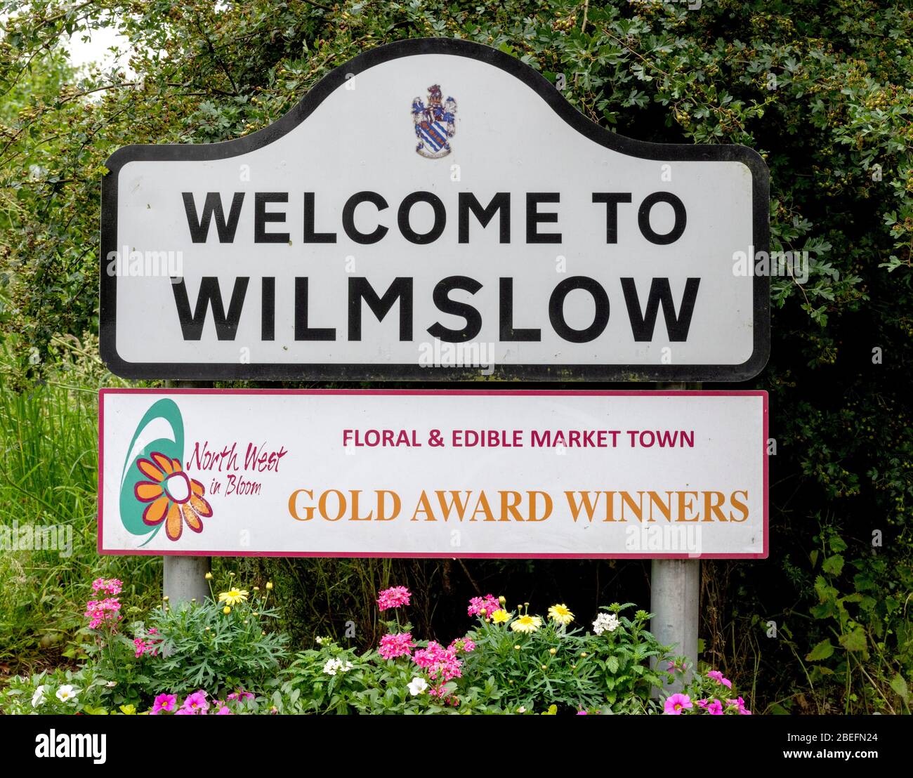 Welcome to Wilmslow sign at village boundary, Wilmslow, Cheshire, England, UK Stock Photo