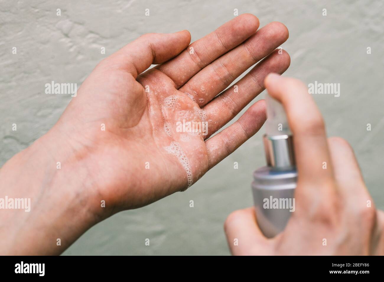 Women washing hands with alcohol gel or an antibacterial soap ...