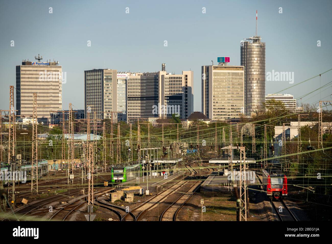 Skyline of the city centre of Essen, railway system from and to Essen main station, in front S-Bahn station Essen-West, Germany Stock Photo