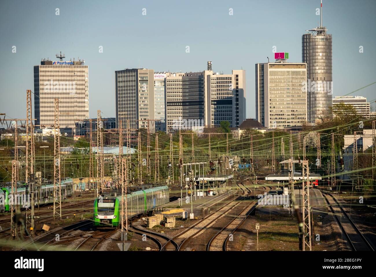 Skyline of the city centre of Essen, railway system from and to Essen main station, in front S-Bahn station Essen-West, Germany Stock Photo