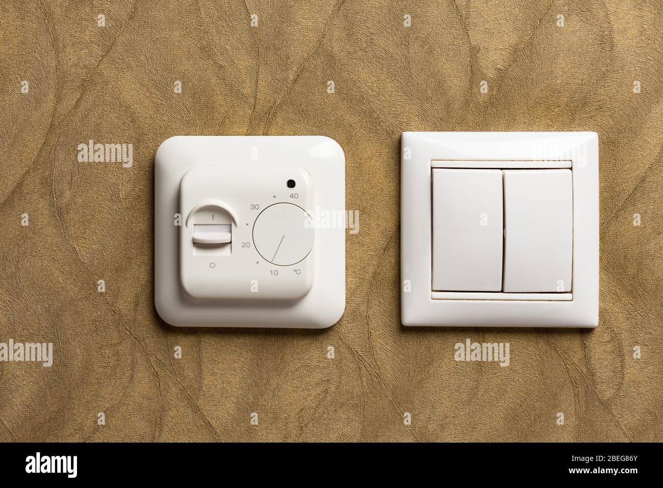 Thermoregulator Of Electric Heating Floor and light switch Stock Photo Alamy
