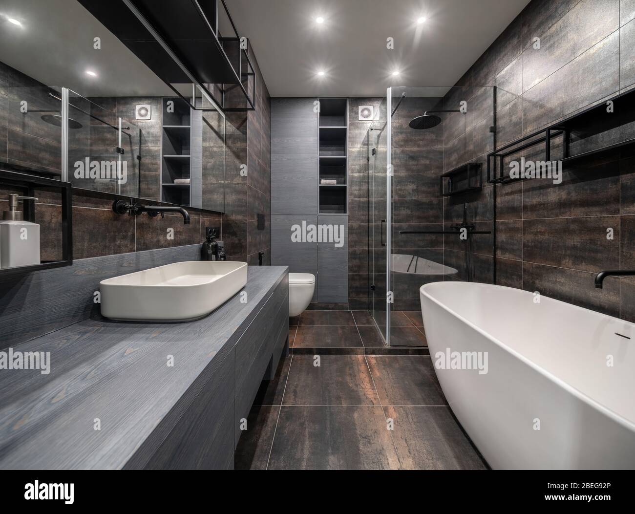 Interior of luminous modern bathroom with bronze walls Stock Photo - Alamy