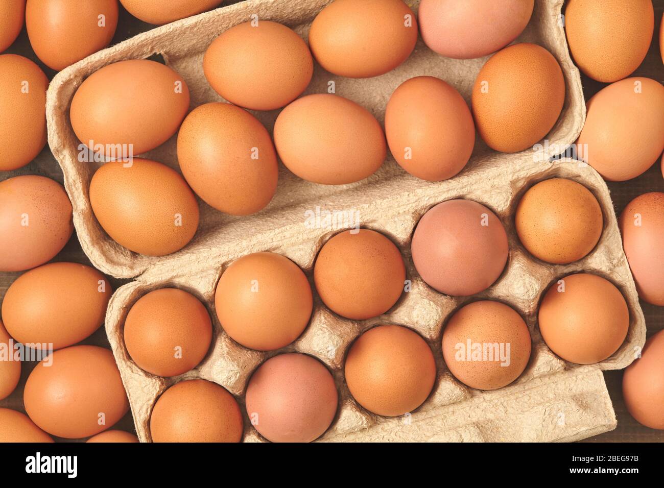 many fresh chicken brown eggs top view Stock Photo Alamy