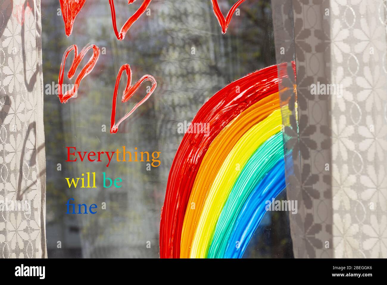 Coronavirus quarantined. To stay home. Everything will be fine. Rainbow and the inscription Stock Photo