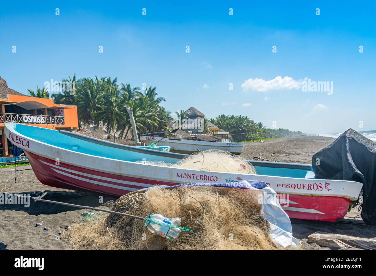 Small fishing boats on the beach of Monterrico, Guatemala Stock Photo
