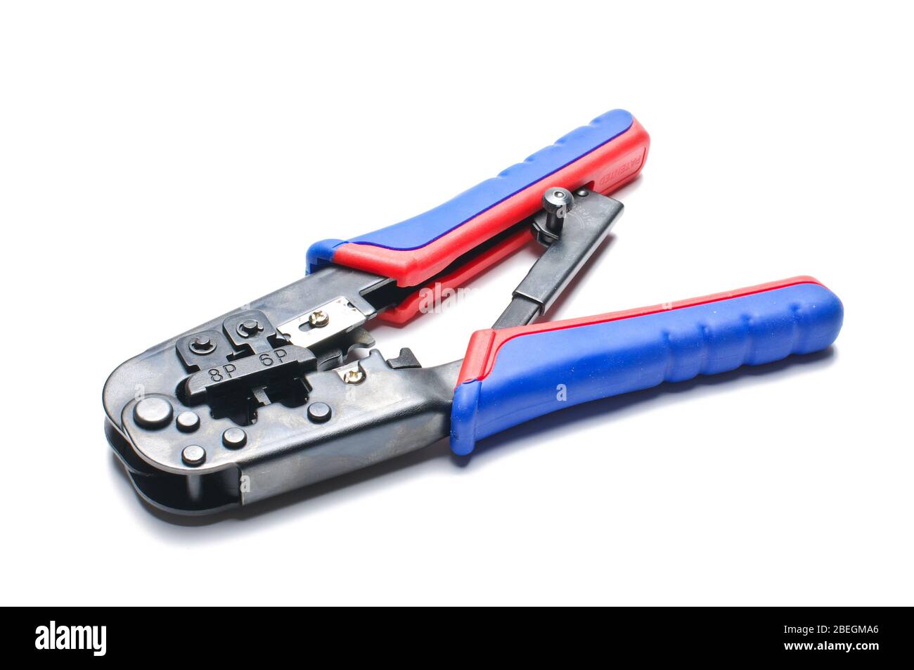 Network cable crimping tool isolated on the white background Stock