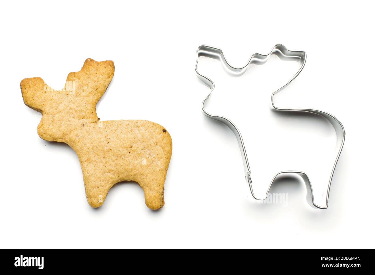Elk shape biscuit and tin dough cutting shape for baking isolated on the white background Stock Photo