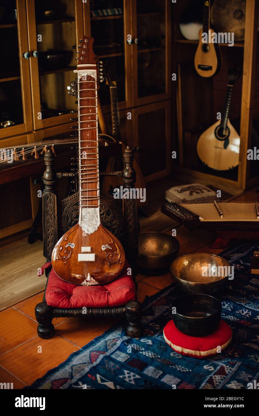 Traditional musical instruments, sitar, cimbalom, singing bowls Stock