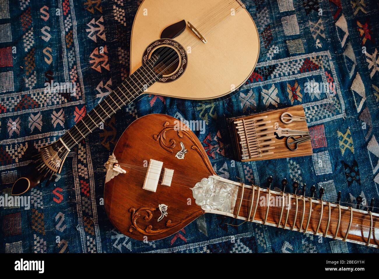 Traditional musical instruments: sitar, Portuguese guitar, kalimba Stock Photo