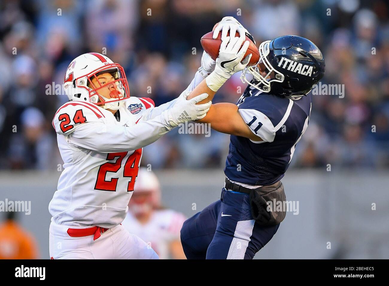 November 16, 2019: Ithaca Bombers wide receiver Jacob Cooney #11 catches a pass as Cortland Red Dragons linebacker Dylan Studer #11 defends during the 2019 Cortaca Jug NCAA football game on Saturday Nov., 16, 2019, at MetLife Stadium in East Rutherford, New Jersey. Ithaca won 32-20. Rich Barnes/CSM Stock Photo