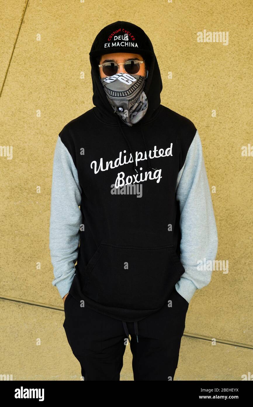 Portrait of a person wearing a mask while waiting to shop in a supermarket in CulverCity, California, USA Stock Photo