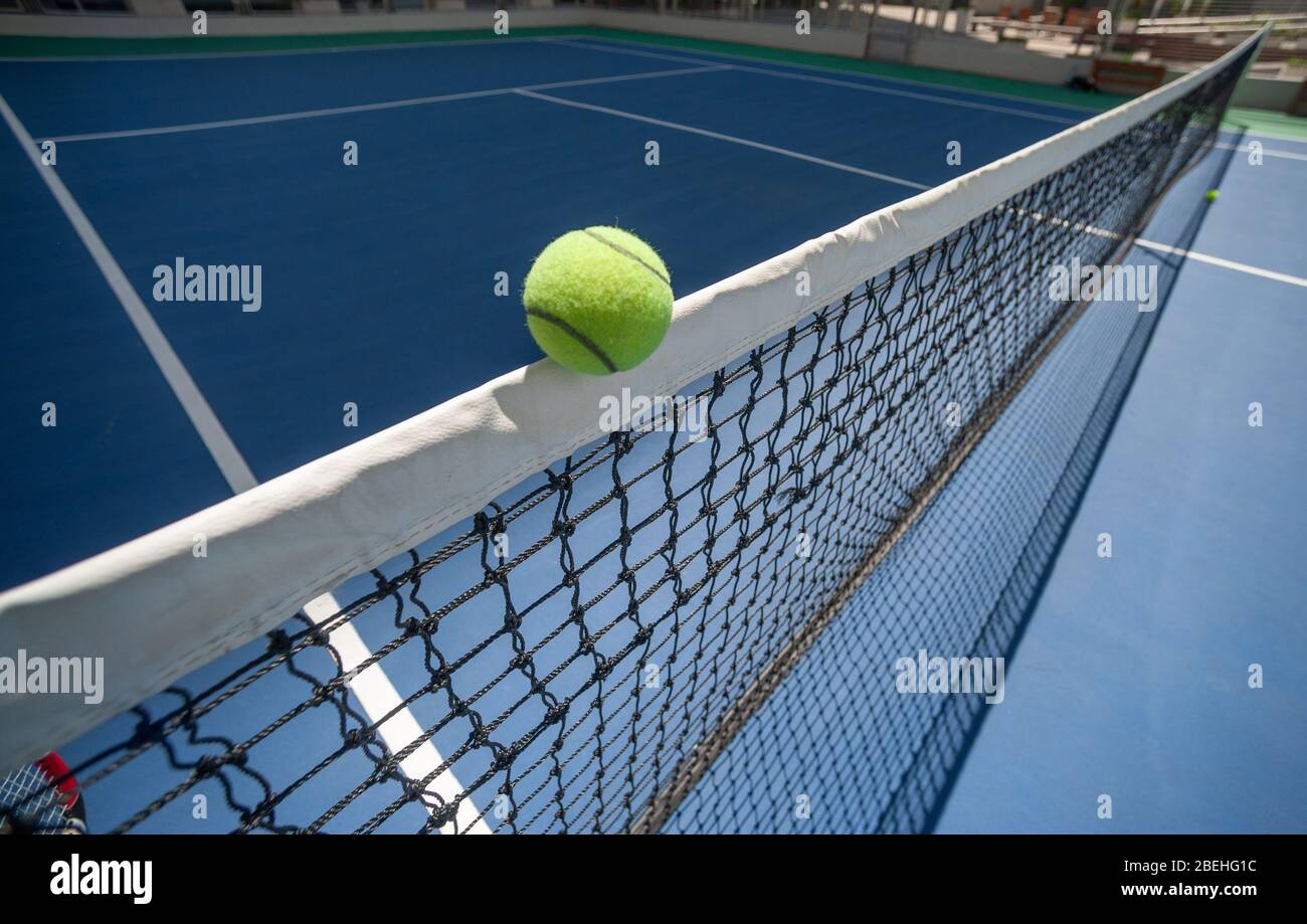 The tennis ball is suspended on the head band Stock Photo - Alamy