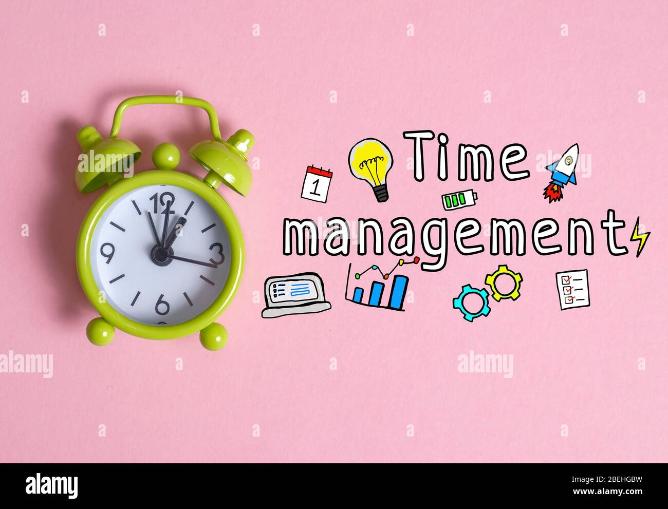 Time management concept - round clock on a pink background with the ...