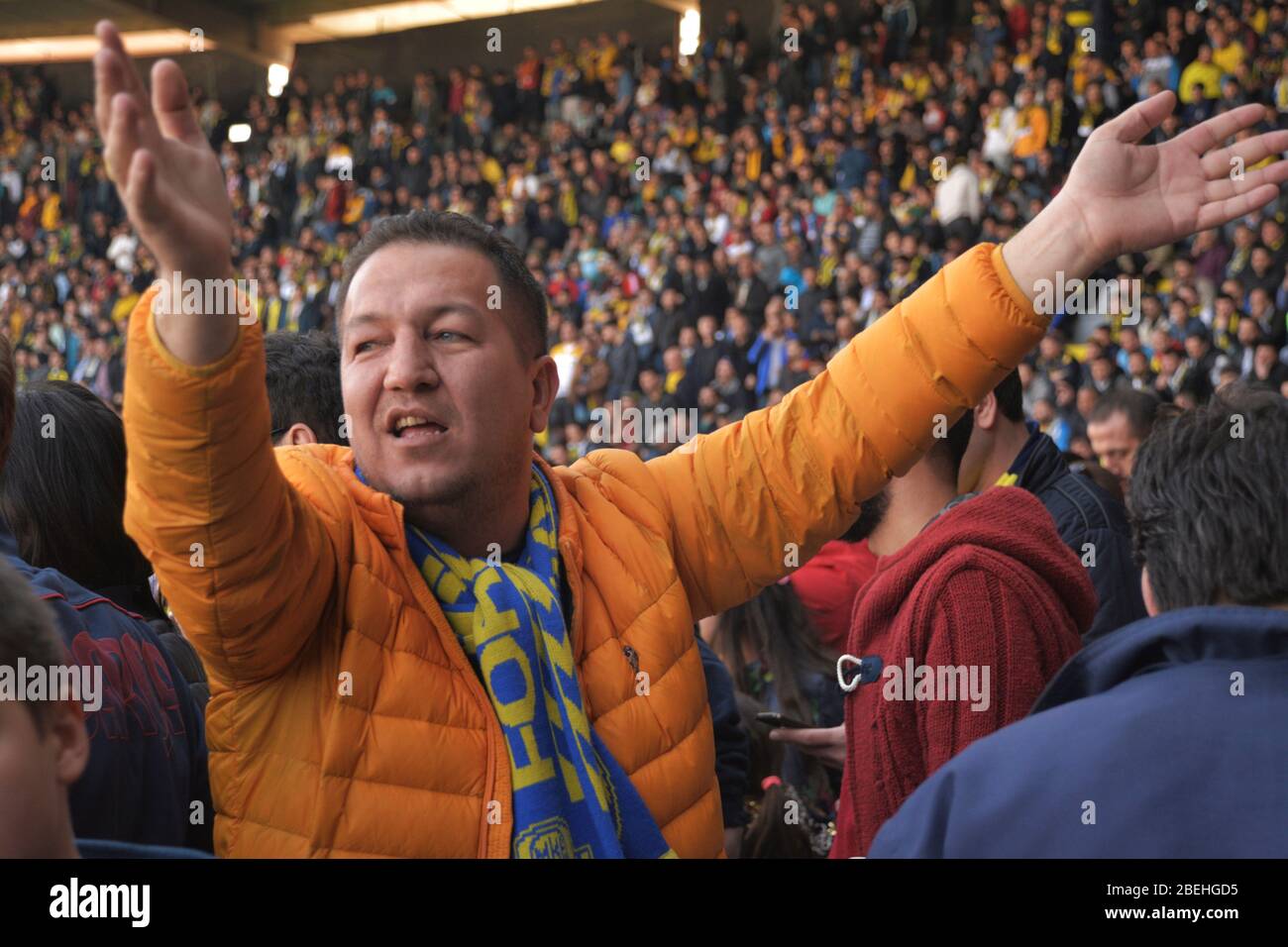 Ankara/Turkey - 05.03.2017 :A football fan in happiness cheering other fans Stock Photo