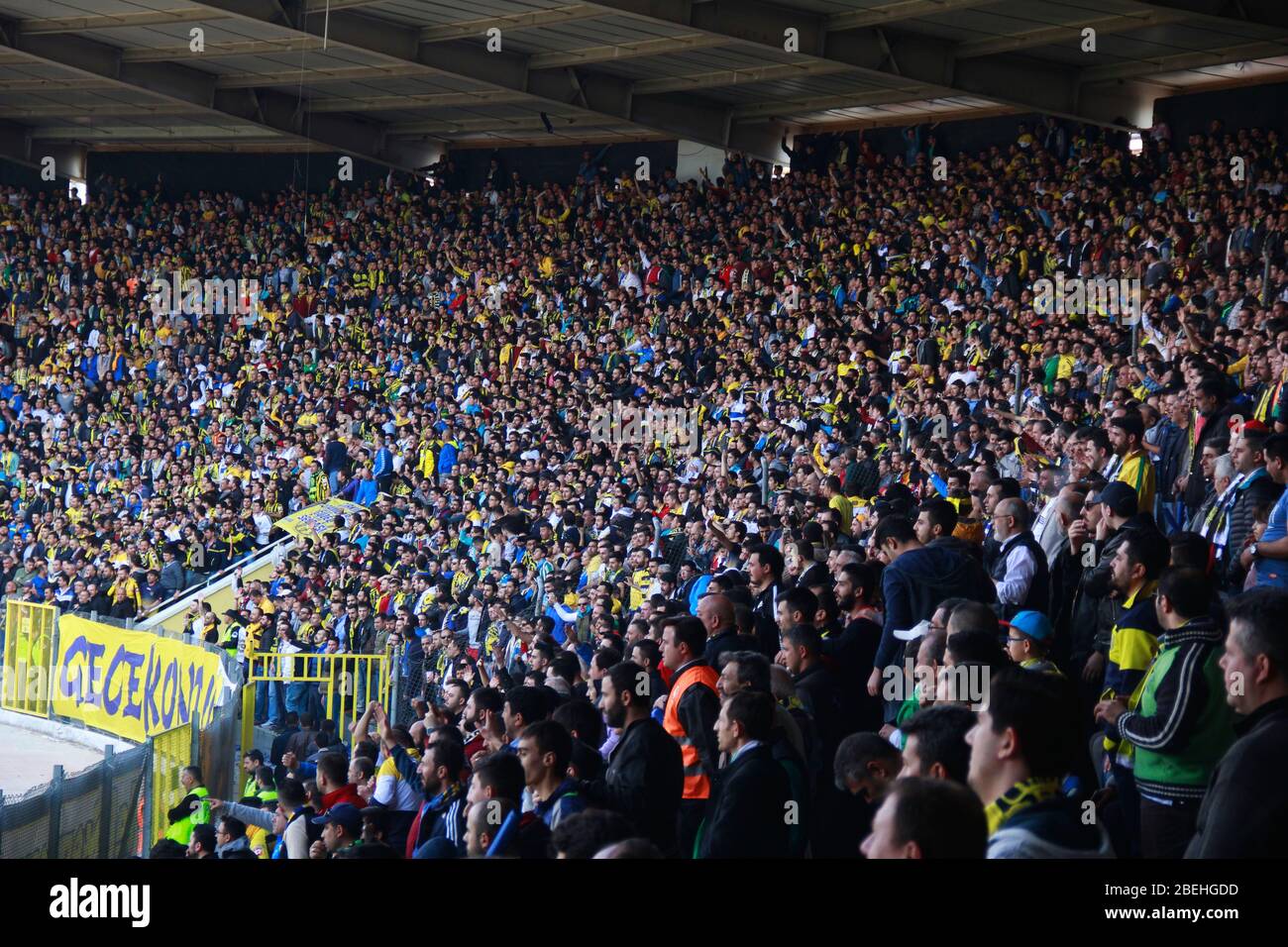 Ankara/Turkey - 05.03.2017 :Massive crowd of football fans watching the game Stock Photo