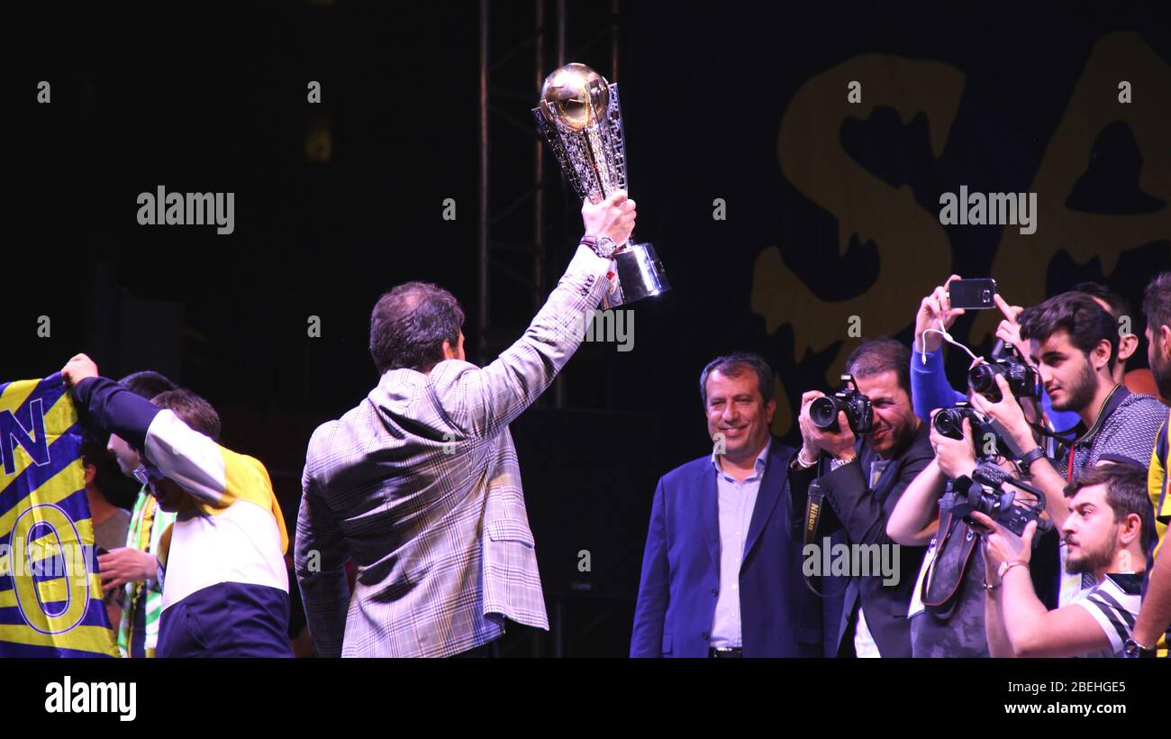 Ankara/Turkey - 05.03.2017 :Manager of the football team raising the championship trophy after the game in front of press Stock Photo