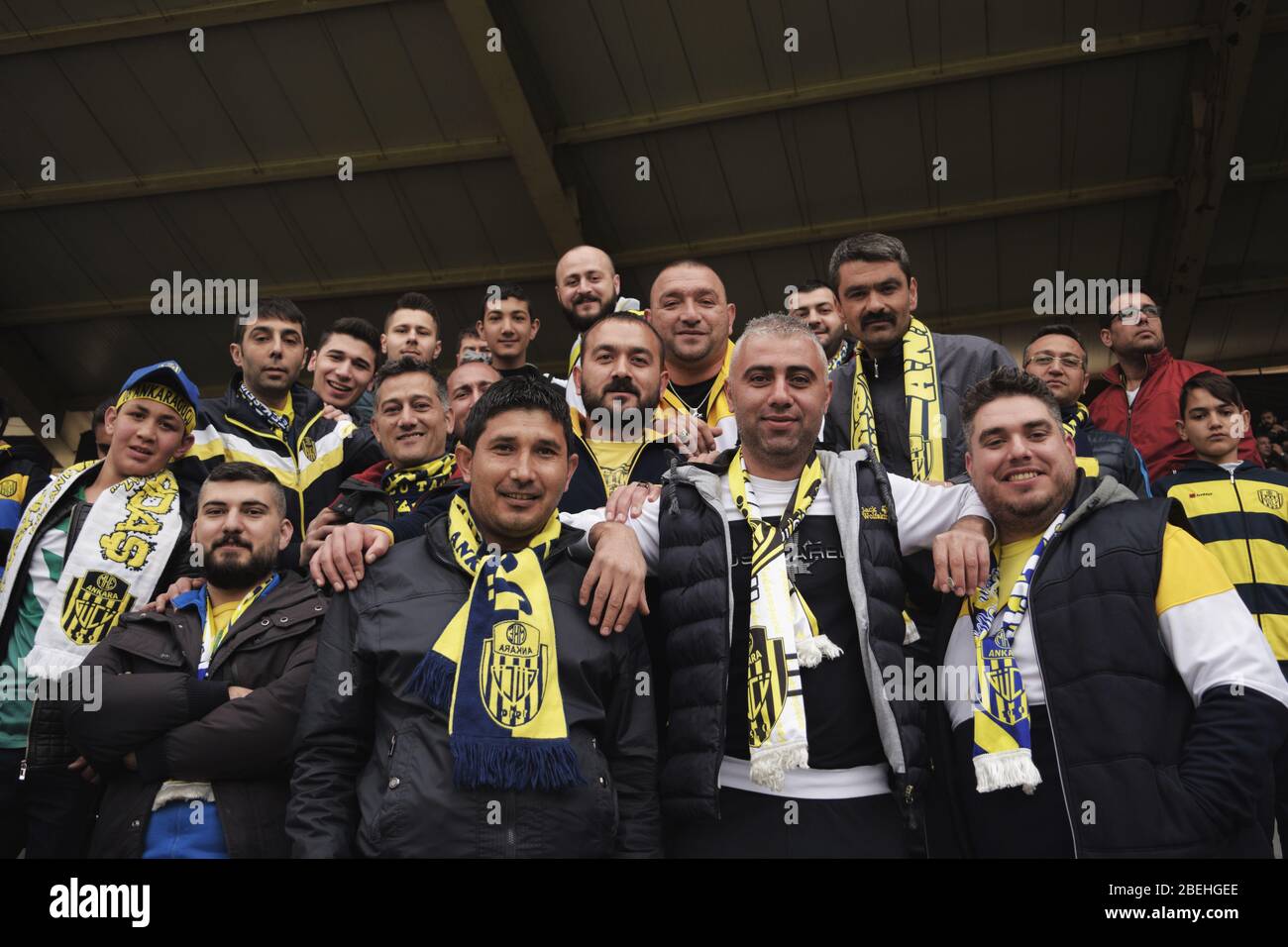 Ankara/Turkey - 05.03.2017 :A group of turkish football fans wearing uniforms looking to camera in Ankara Stock Photo