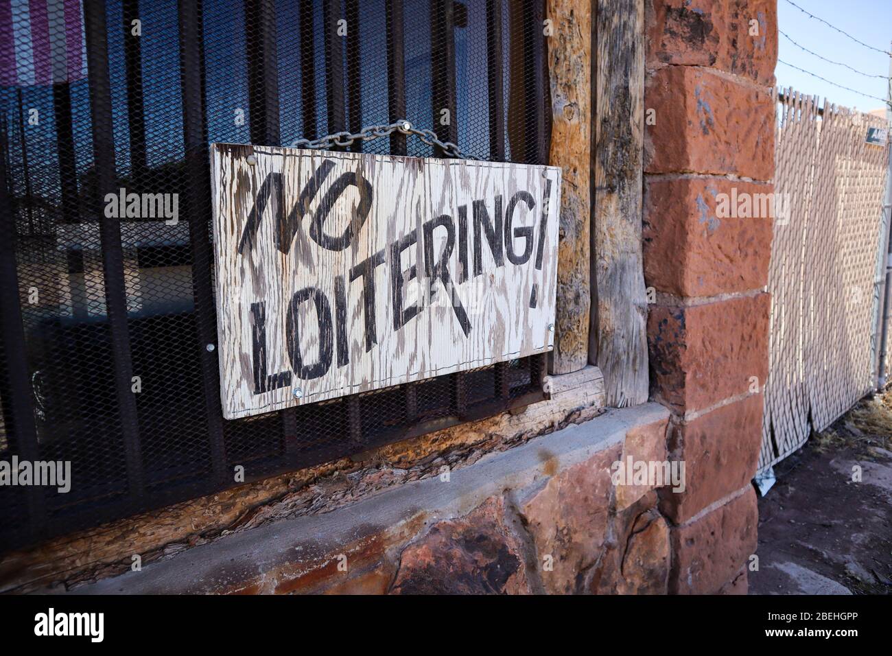 Old Faded No Loitering Sign Stock Photo