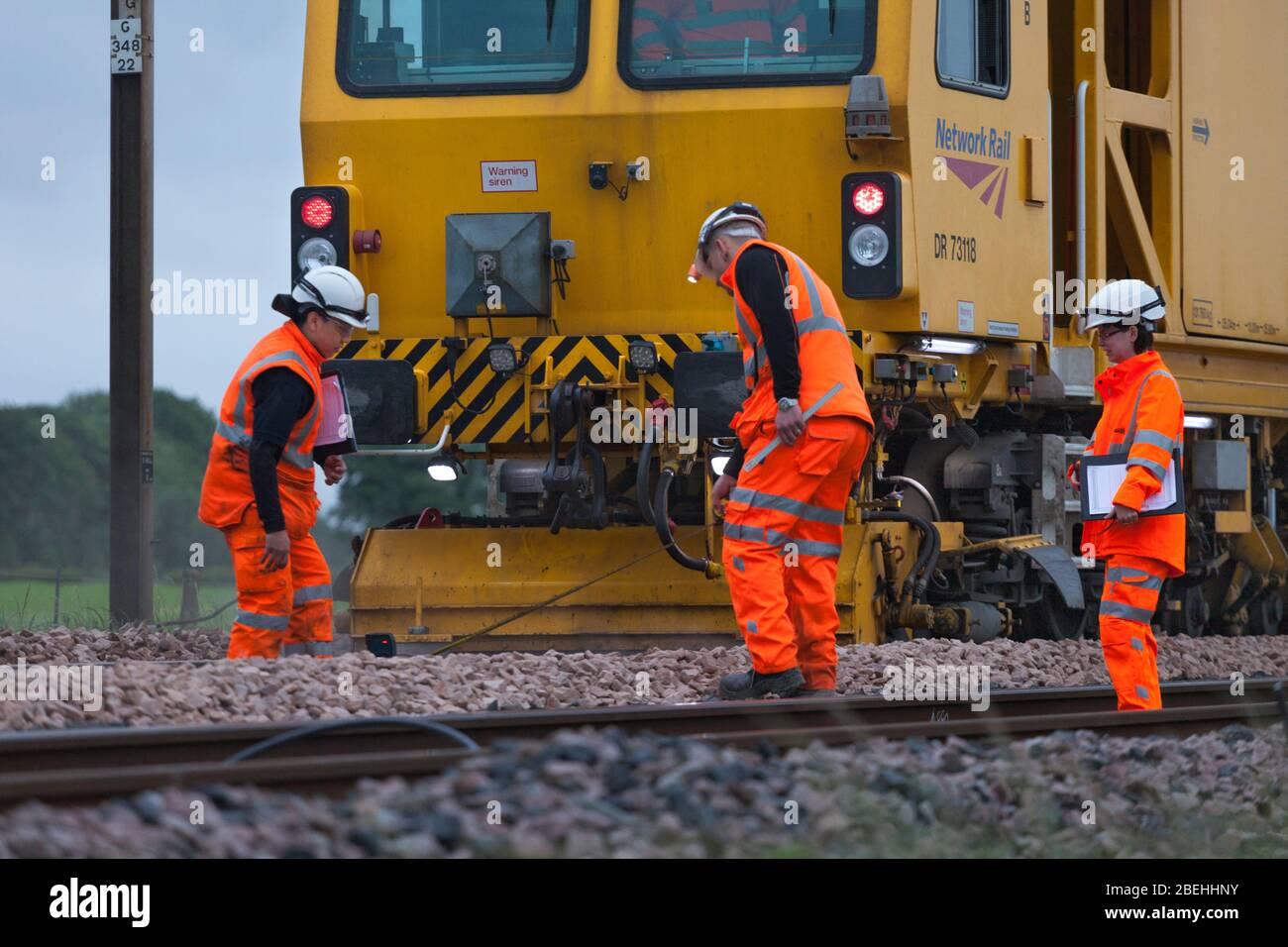 Tamping machine with railway contractors for Network Rail checking