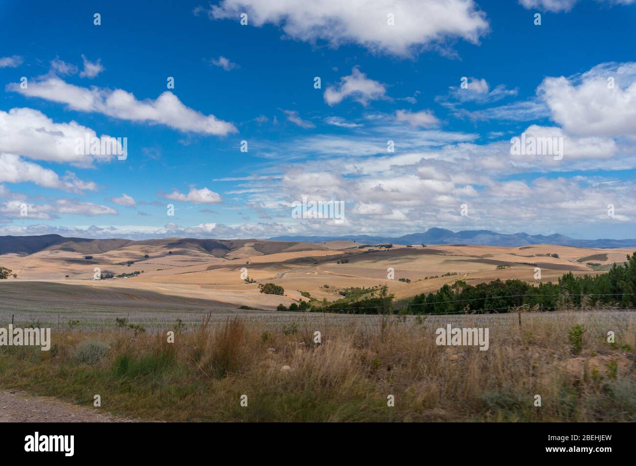 Vast South African countryside landscape with dry grass and hills