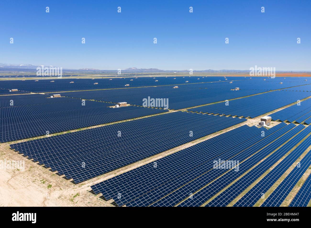 Aerial view of photovoltaic (PV) green solar ranch in the Antelope Valley in the Mojave desert of California Stock Photo