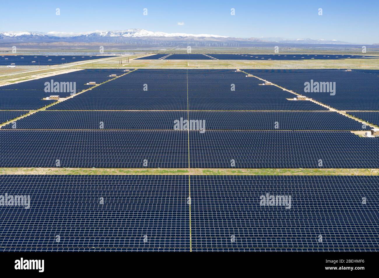 Aerial view of photovoltaic (PV) green solar ranch in the Antelope Valley in the Mojave desert of California Stock Photo