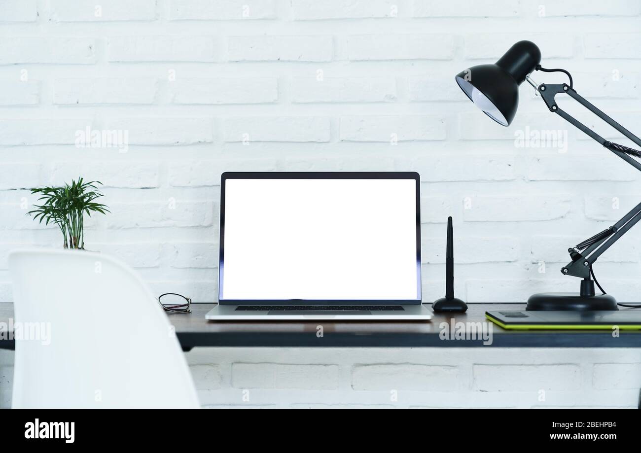 laptop computer white screen on workspace Stock Photo Alamy