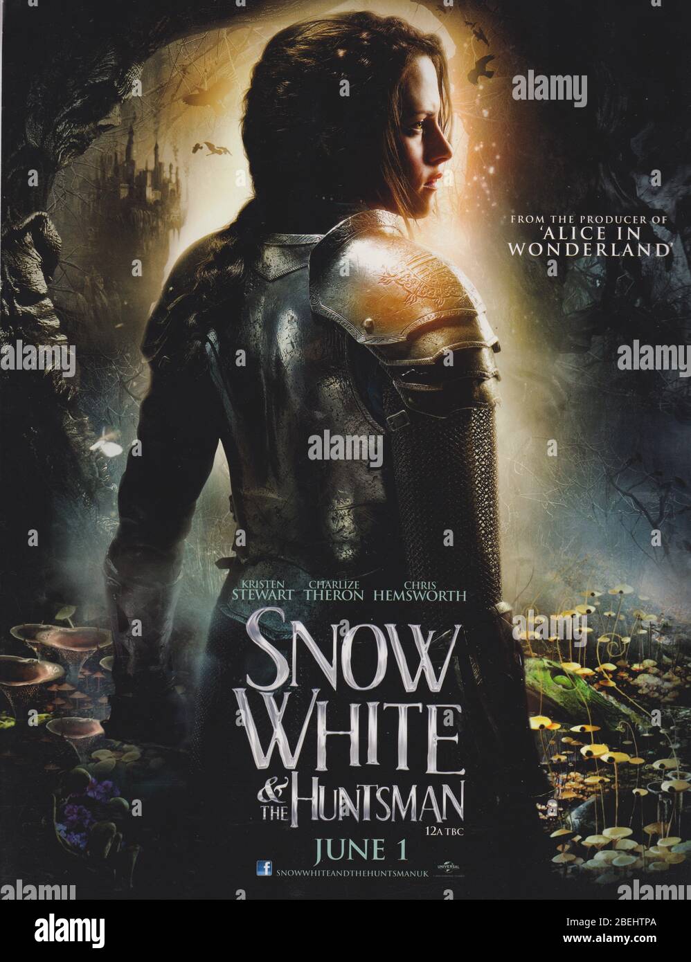poster advertising Snow White and the Huntsman in paper magazine from 2012, cast includes Kristen Stewart, Charlize Theron, Chris Hemsworth Stock Photo
