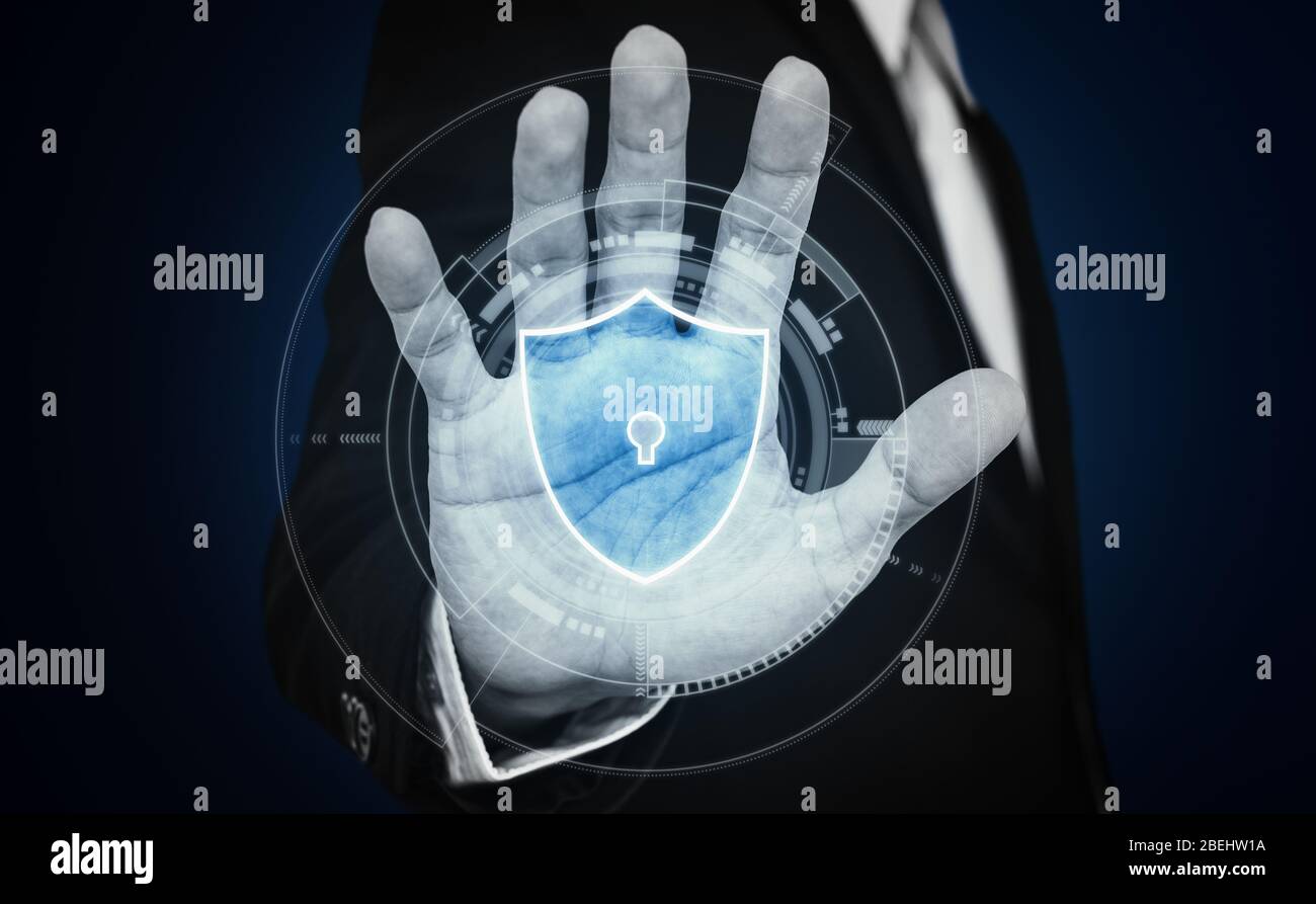 Identity verification security system technology. Businessman locking and protecting online data and etc. by hand Stock Photo