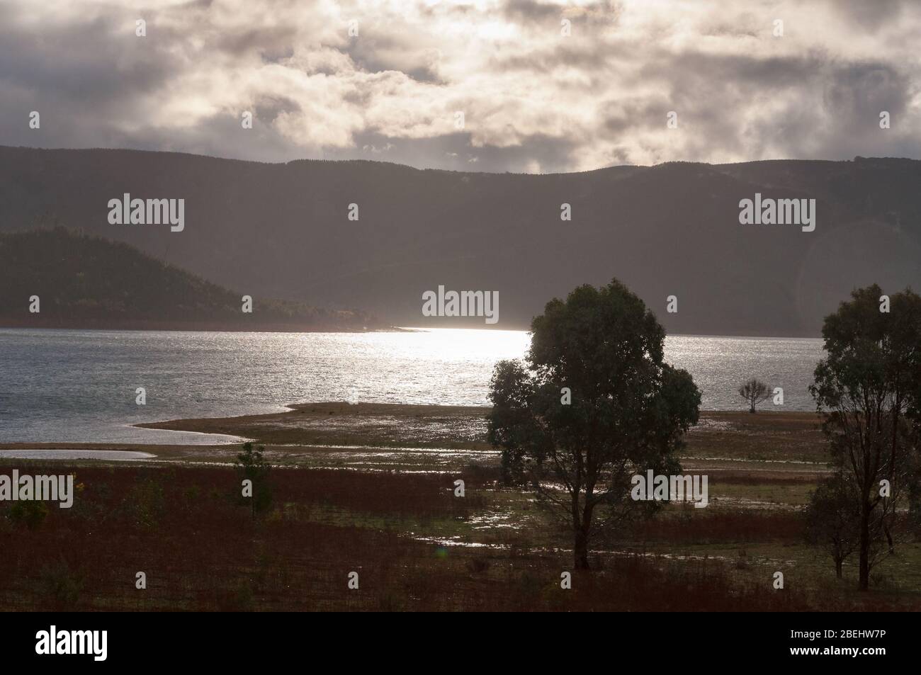 Landscape with lake and mountains with bright sunshine after rain Stock ...