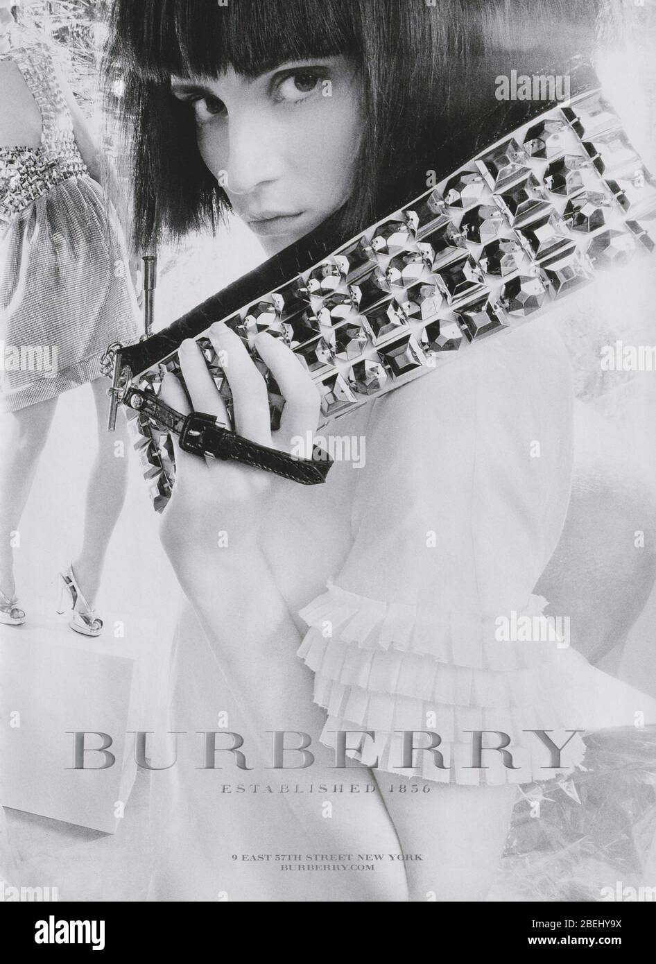 poster advertising Burberry fashion house in paper magazine from 2007 year, advertisement, creative Burberry advert from 2000s Stock Photo