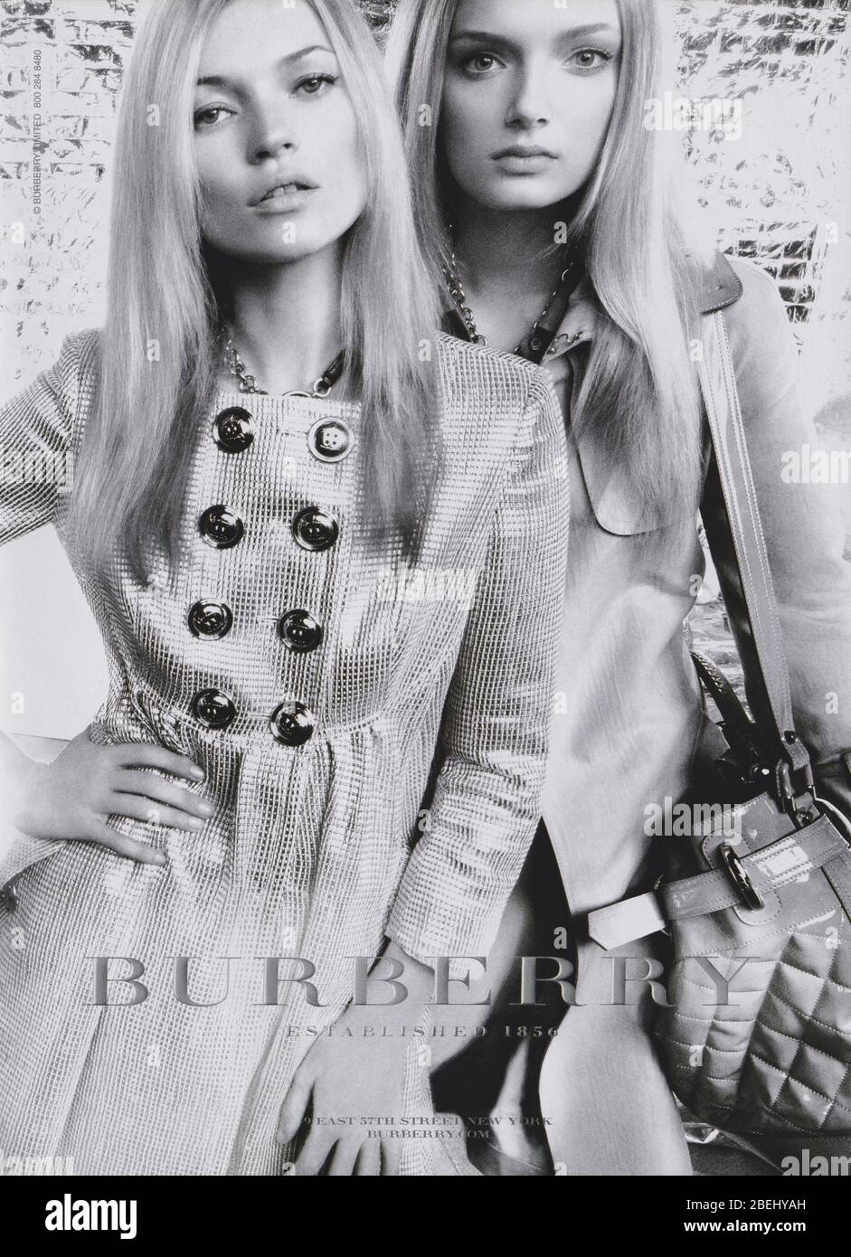 poster Burberry house with Kate Moss, Lily Donaldson in paper magazine from 2007, advertisement, creative Burberry 2000s advert Stock Photo - Alamy