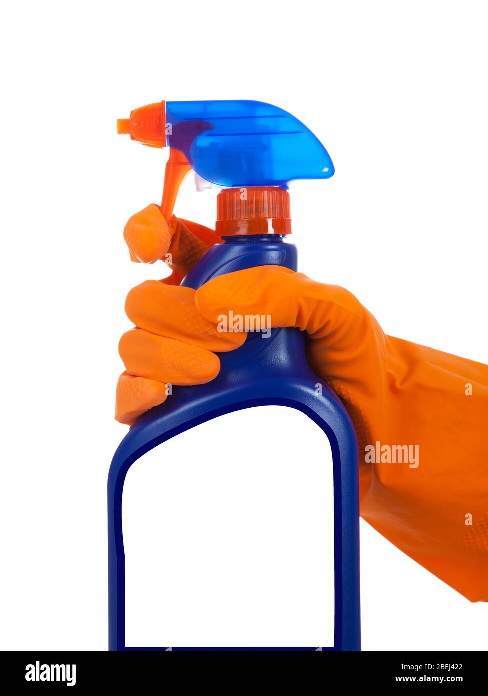 A gloved hands holding a spray bottle of cleaning, disinfecting chemical on a white background Stock Photo