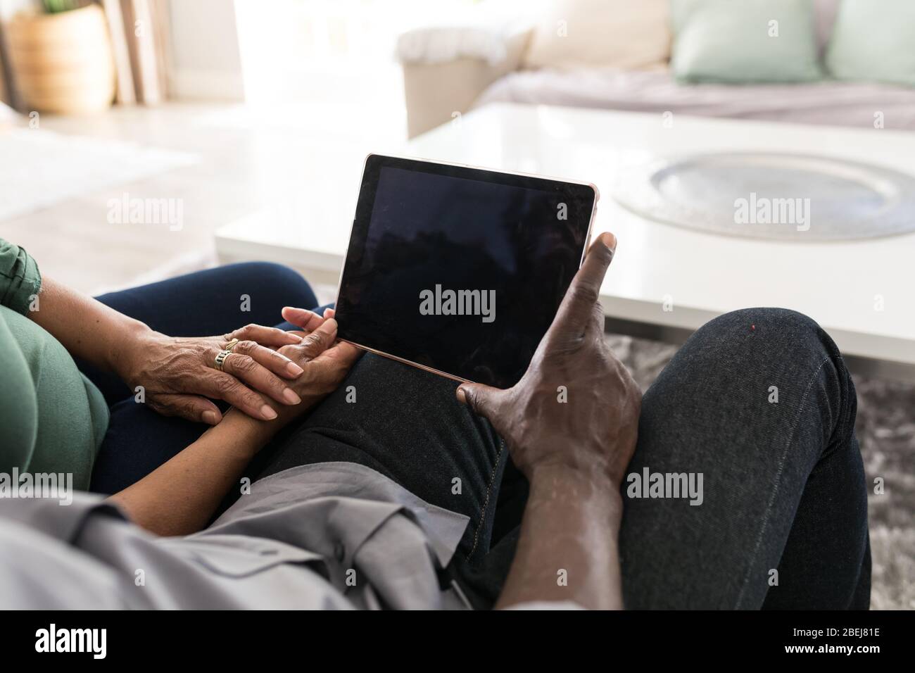 A senior African American couple hands Stock Photo - Alamy
