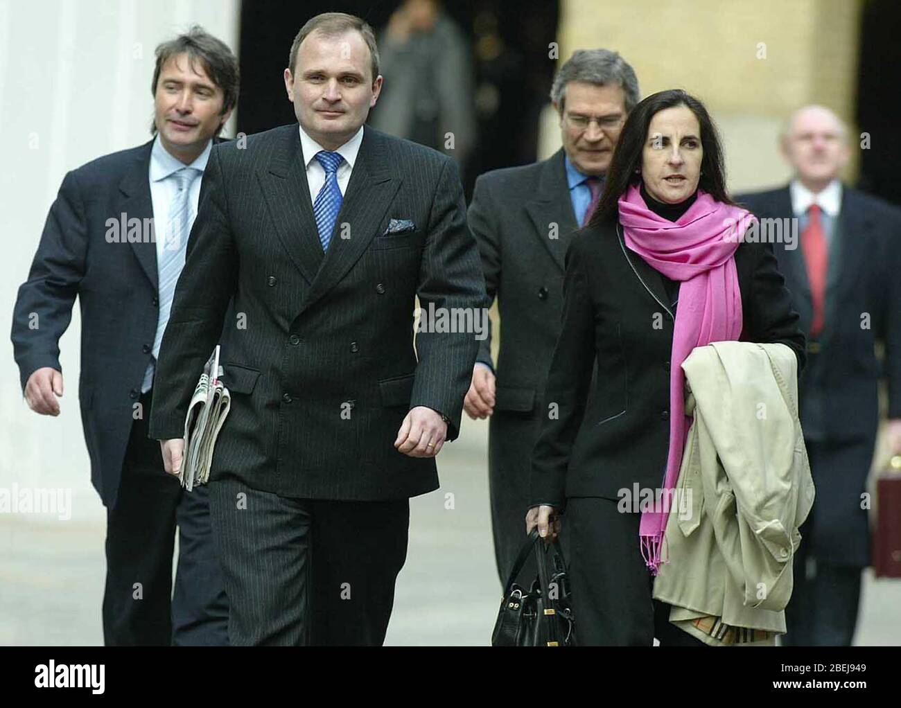 Major Charles Ingram 39 and his wife Diane 39 arriving at Southwark Crown Court accompanied by there agent David Thomas (Far Left) The couple, along with Tecwen Whittock 53 all deny 'procuring the execution of a valuable security by deception' on the game show Who Wants To Be A Millionaire on September 10, 2001. Stock Photo