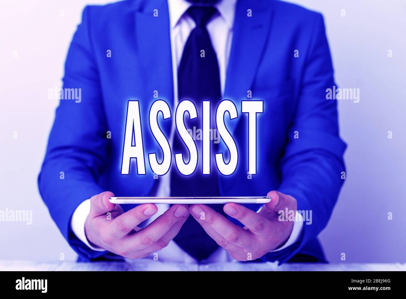 Word writing text Assist. Business photo showcasing help them to do a job or task by doing part of the work for them Businessman in blue suite with a Stock Photo