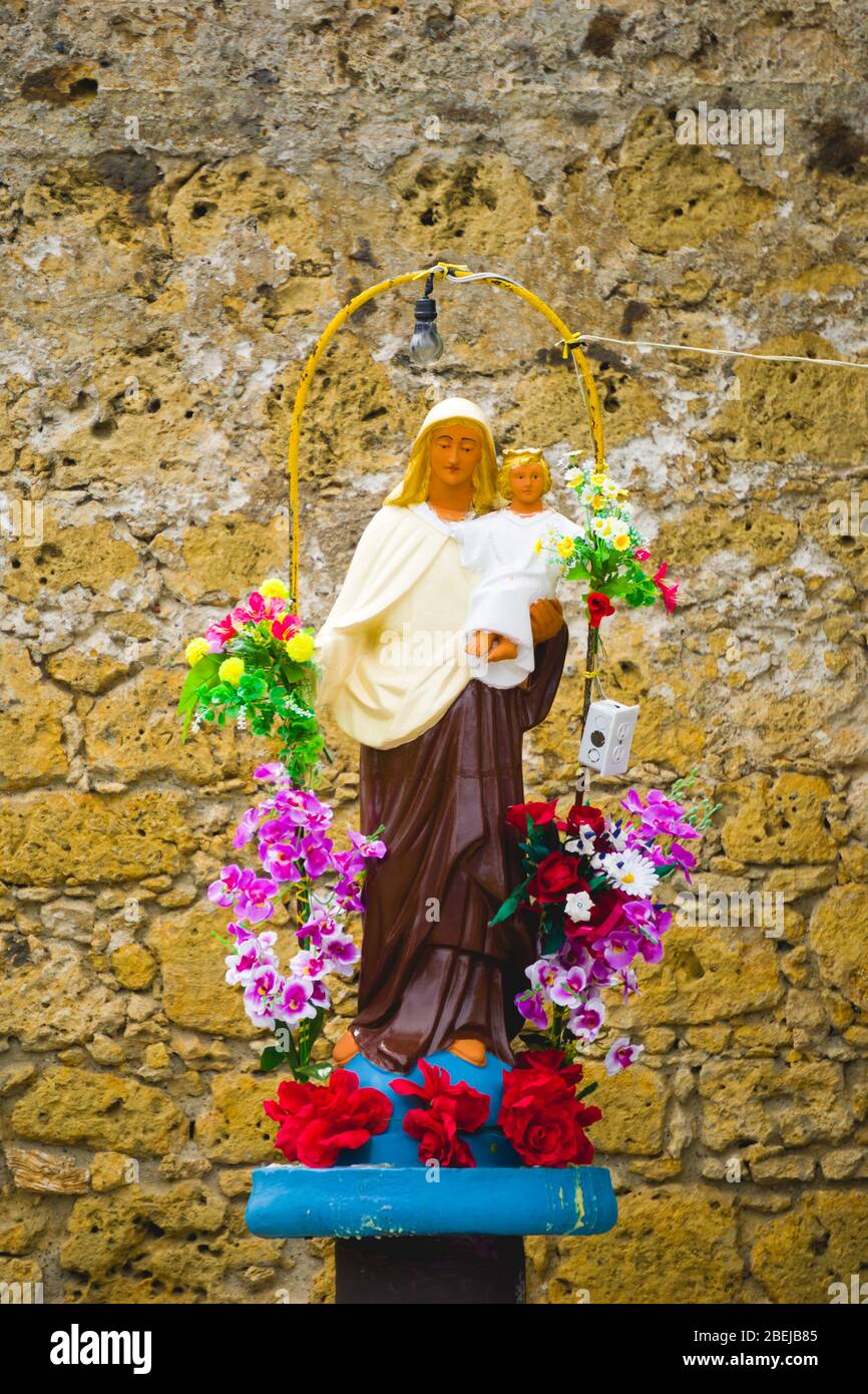 Christian religious sculpture of the Virgin Mary with the Child Jesus in Cartagena Colombia Stock Photo