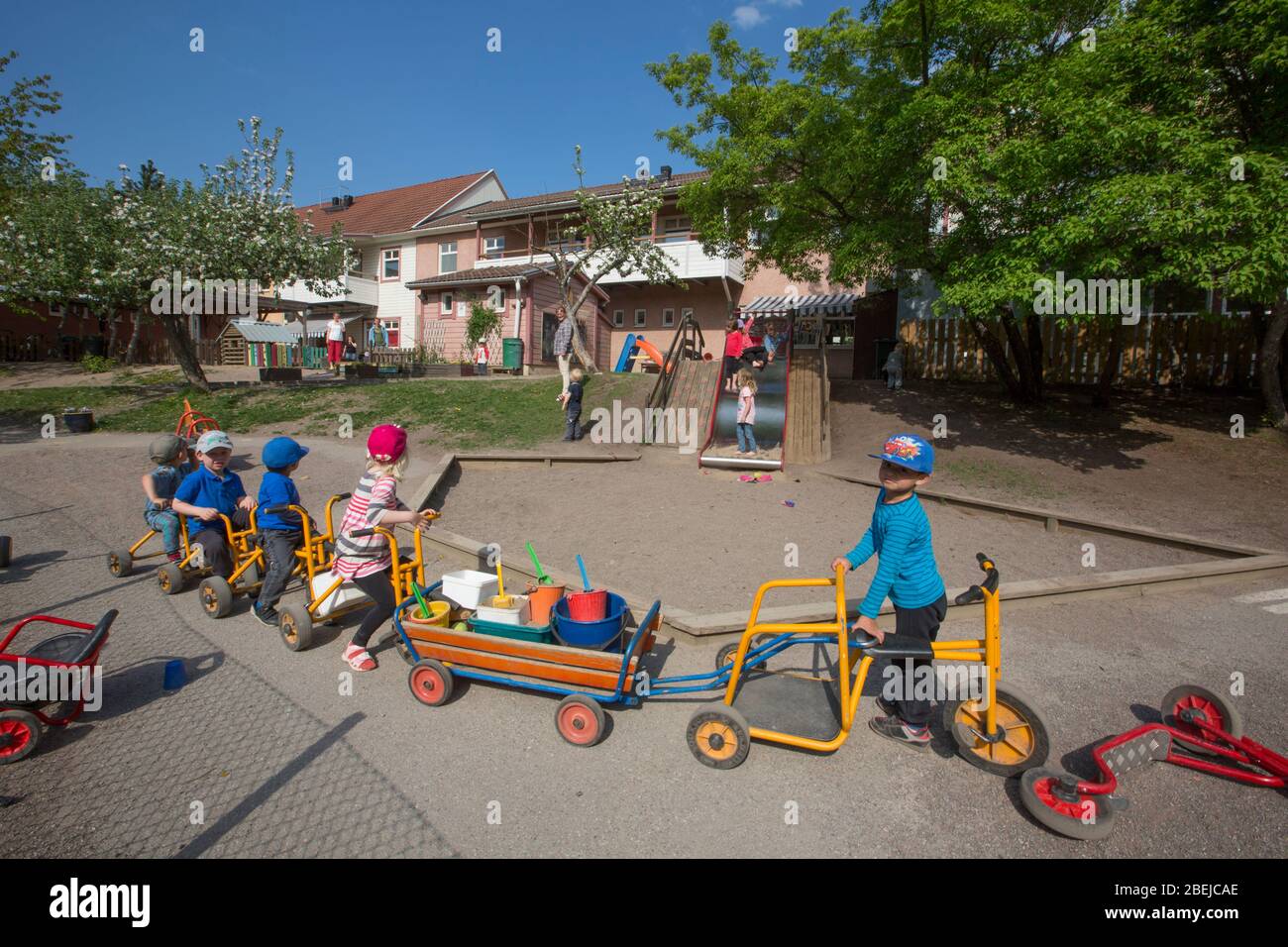 Children play outdoors at a preschool. Stock Photo