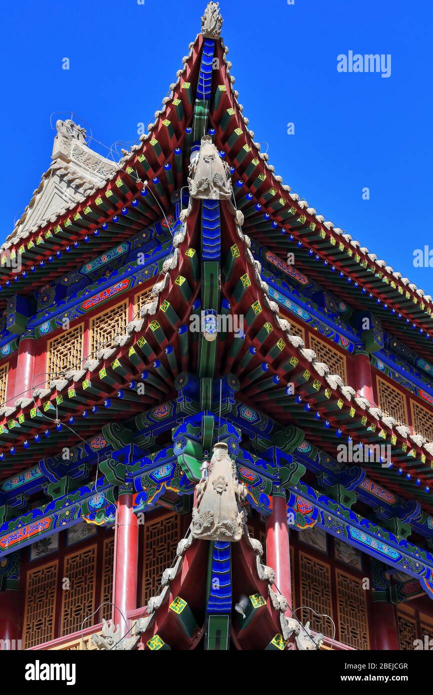 Upturned eaves with chiwen and chishou ornate-Xieshan style roof-Jiayuguan fortress-Gansu-China-0788 Stock Photo