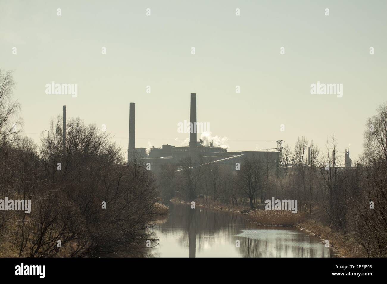 Factory producing fertilizers seen from afar. Stock Photo