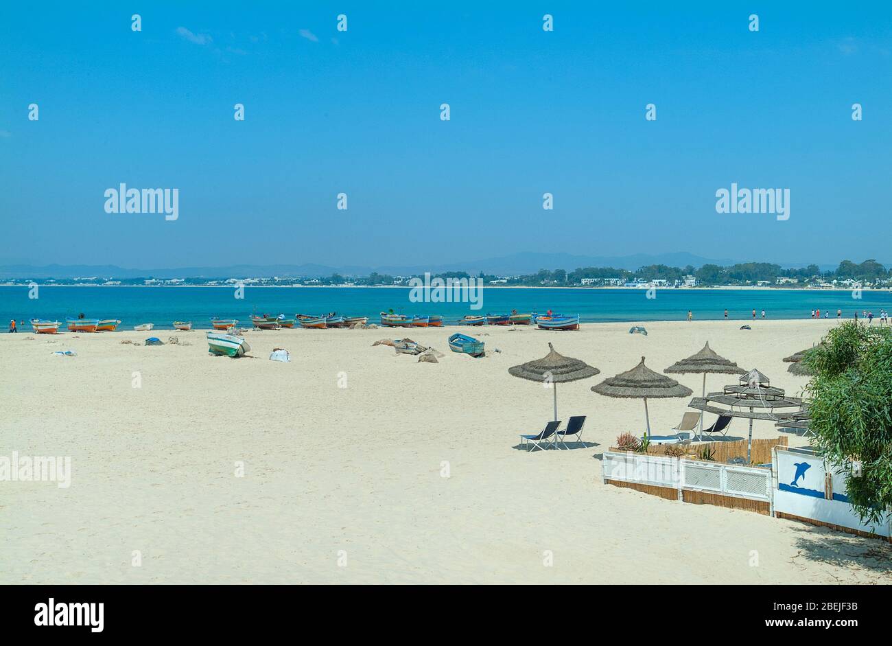 Ribat Town Beach with fishing boats and beach bar, Hammamet, Tunisia