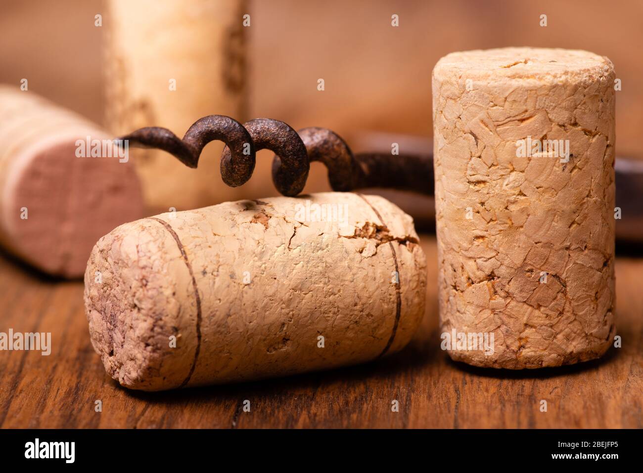 in the foreground, corks of Italian wine, and vintage corkscrews Stock Photo