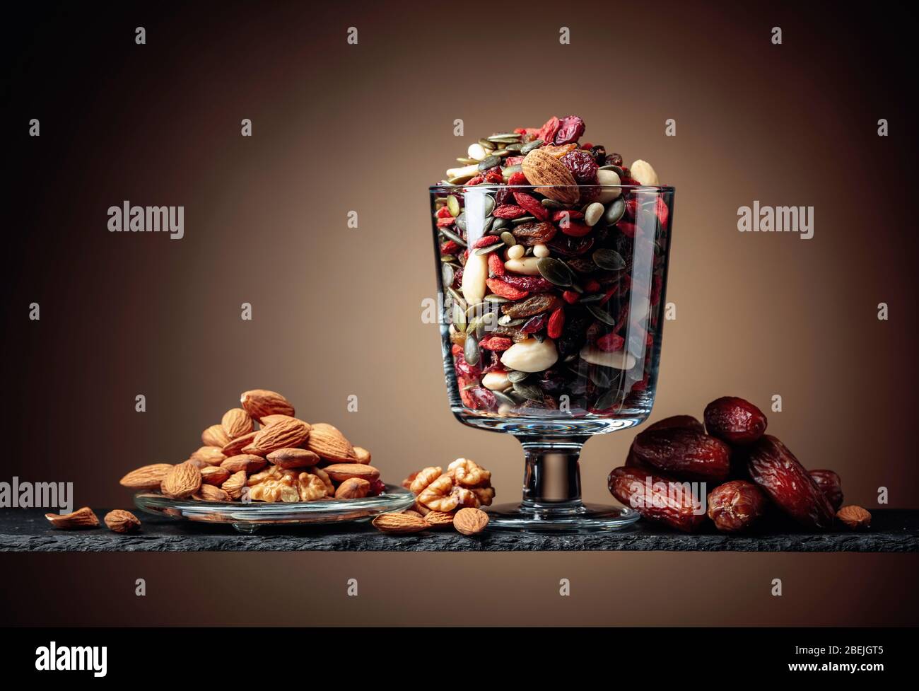 Dates and dried fruits, nuts and seeds. Copy space Stock Photo Alamy